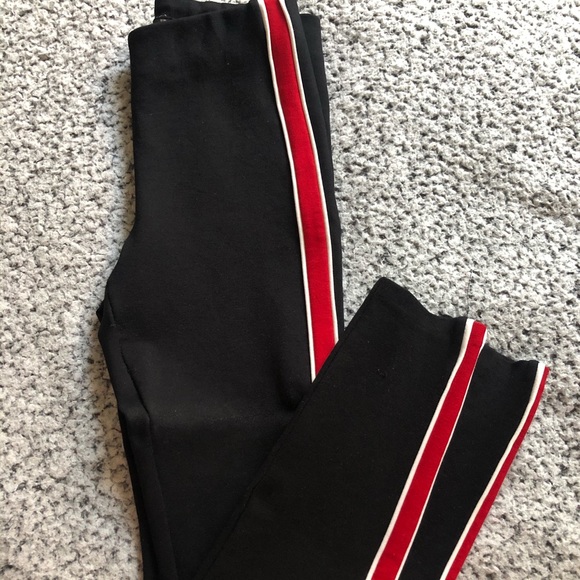 Black leggings with red strips on the side. - Picture 1 of 3
